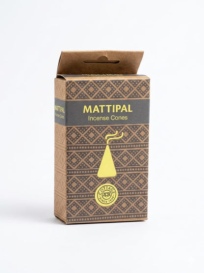 A box of Mattipal Incense Cones on a clean white background. The packaging is brown with a geometric pattern, a dark gray band with gold lettering, and a gold incense cone illustration.