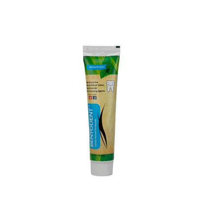 A tube of Bentodent toothpaste on a plain white background. The tube is beige with green leaf graphics, a blue vertical brand label, and a white cap.