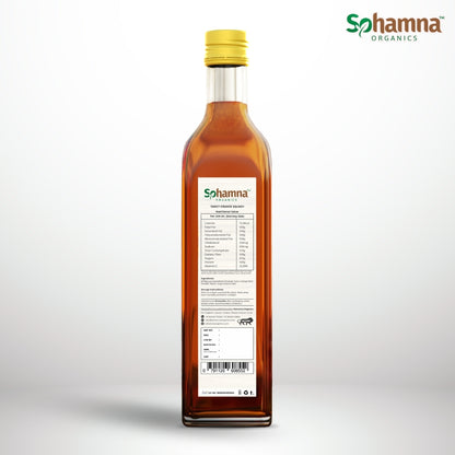 Natural orange squash bottle, back label view with amber glass and yellow cap