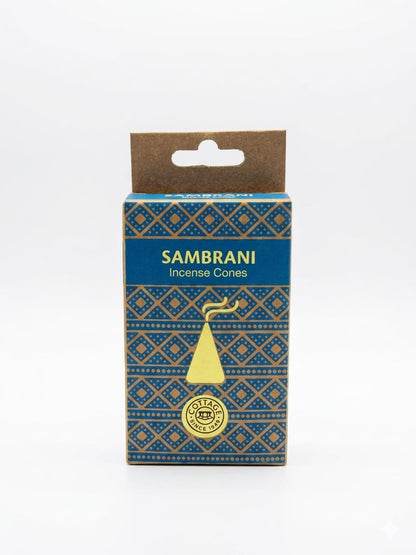A box of Sambrani Incense Cones on a plain white background. The packaging features a blue and gold geometric pattern, a brown cardboard hanger tab at the top, and a yellow illustration of an incense cone.